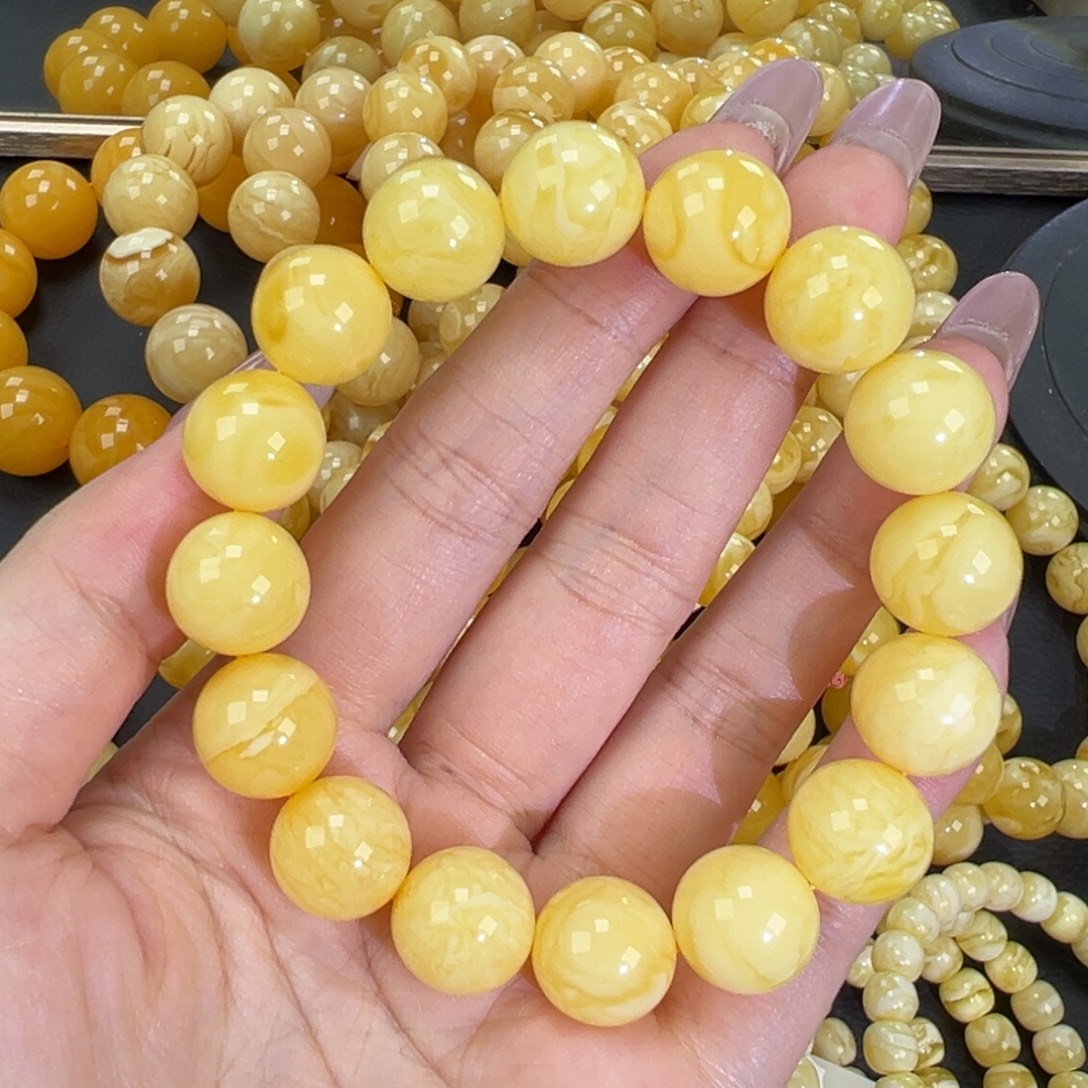 琥珀未镶嵌手链23.3黄白妖花