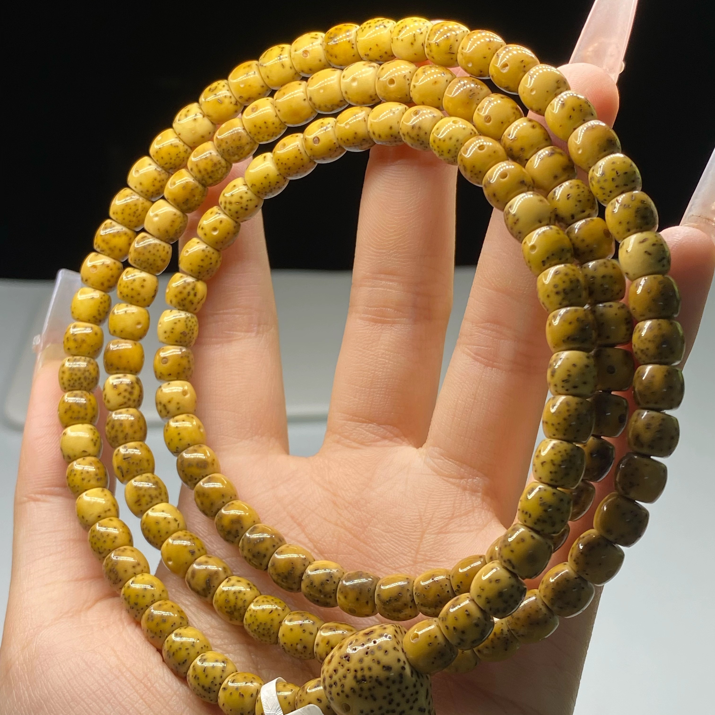 海南同枝同朵石玉料鸡油黄7x6直切半壁江山大留白长串108
