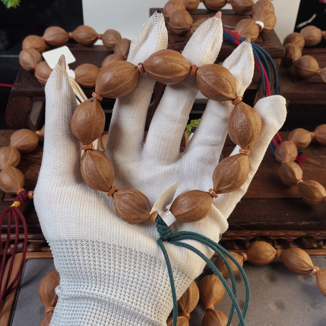 璐***手串橄榄核原生态梅林铁核18*27