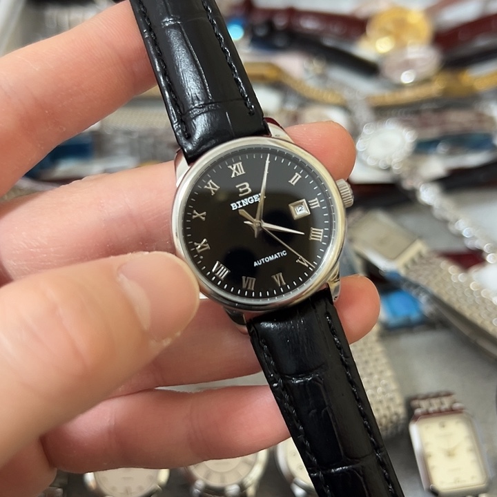 涅***X钢牛皮（革）钢石英机芯