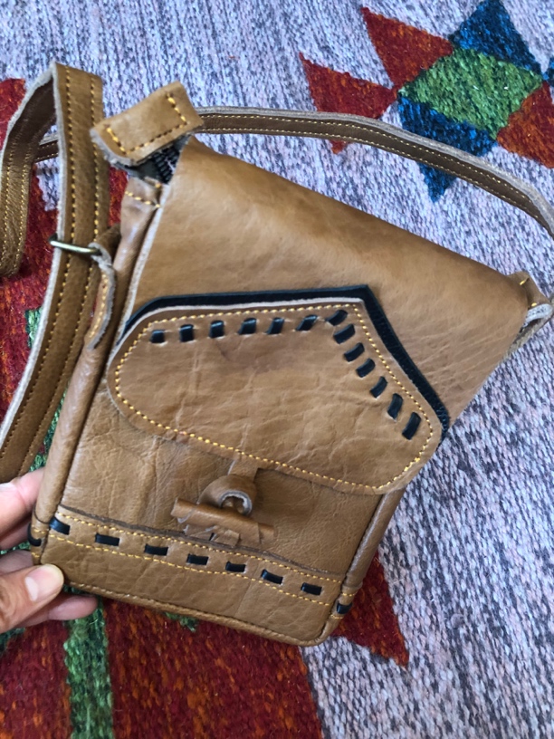 尼泊尔高山牦牛头层牛皮生皮手机包