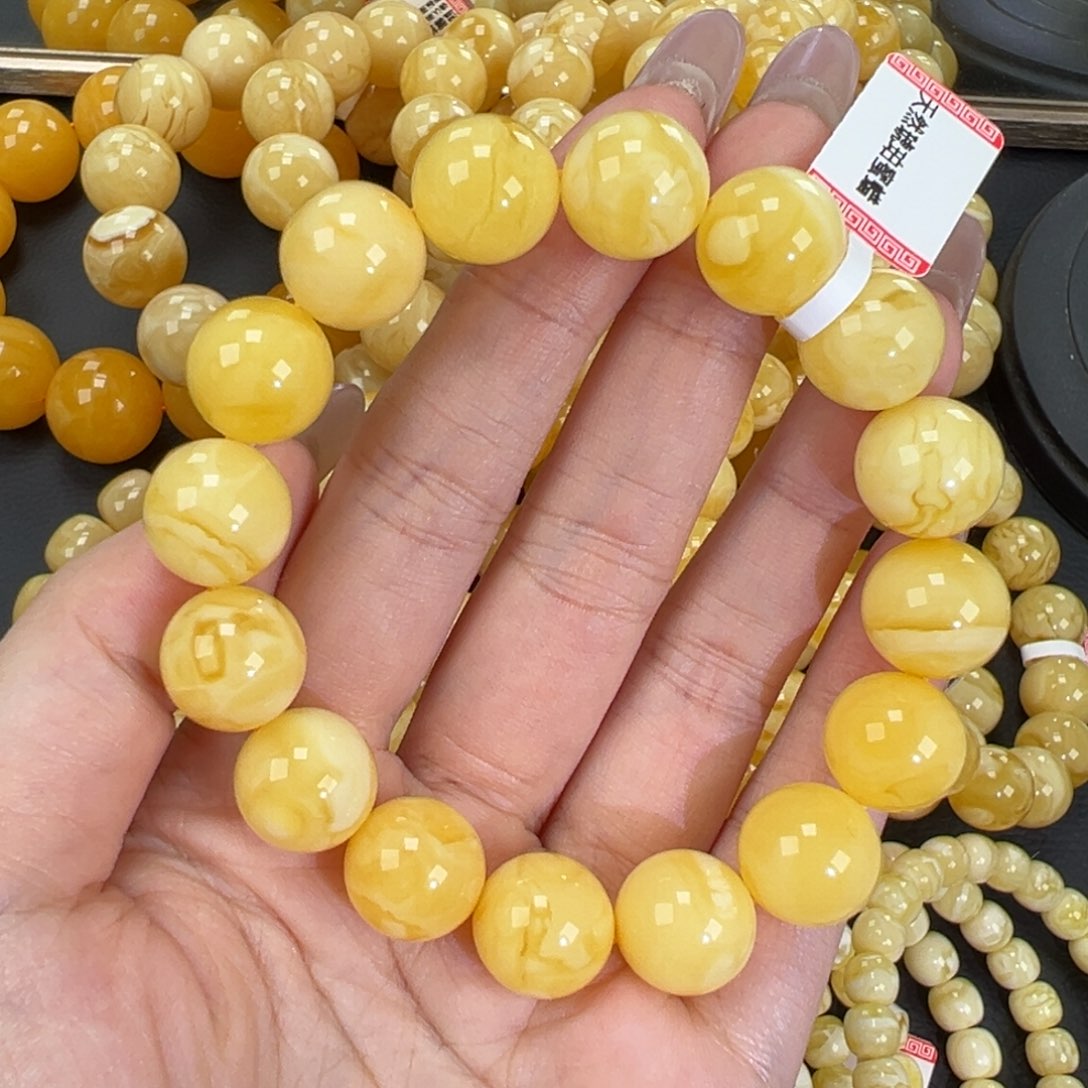 琥珀未镶嵌手链23.2黄白妖花