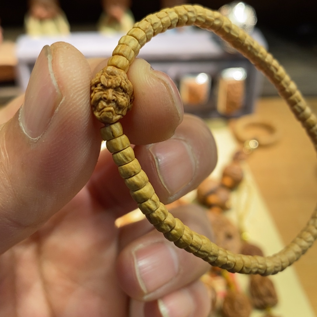 潍坊核雕桃核雕刻罗汉头福利串