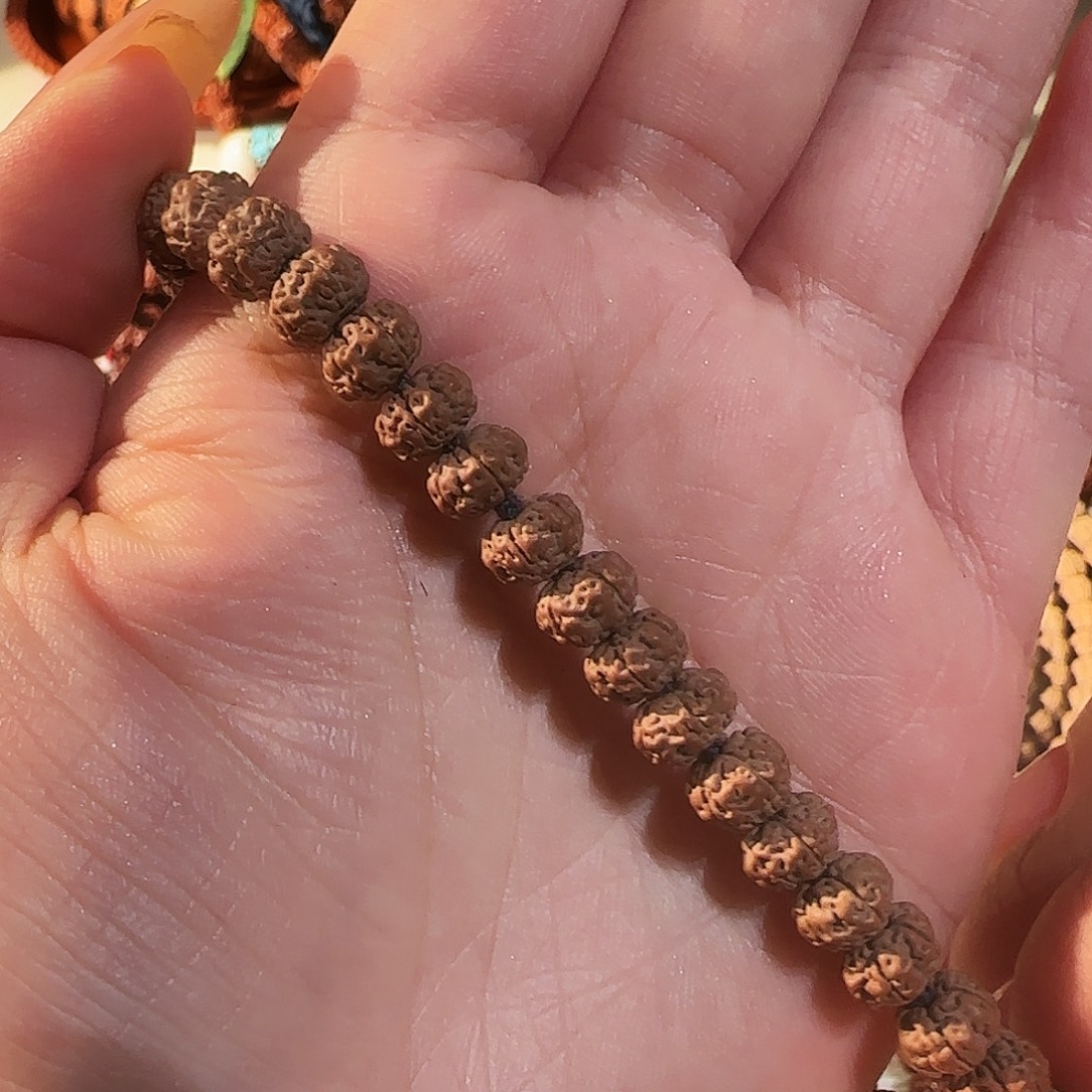 卢***州吊坠柏香籽/百香籽收藏平细手持