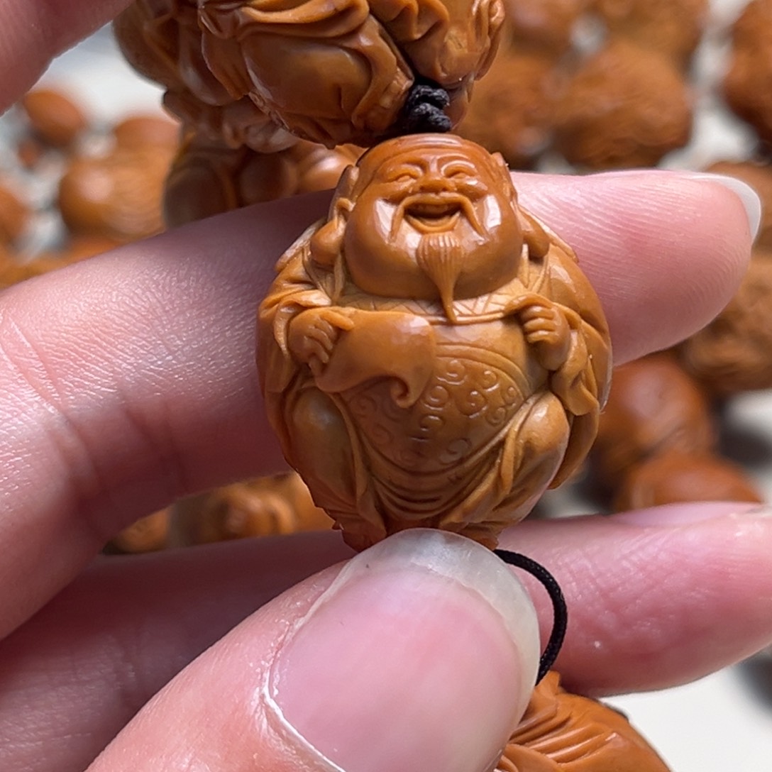 橄榄核吊坠洛*人财神