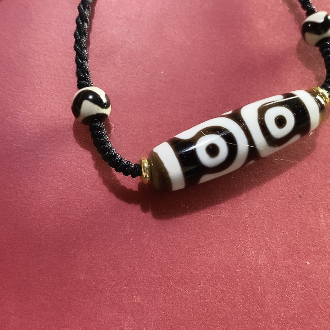 赵***林玛瑙/玉髓（覆膜）未镶嵌颈饰行运三眼