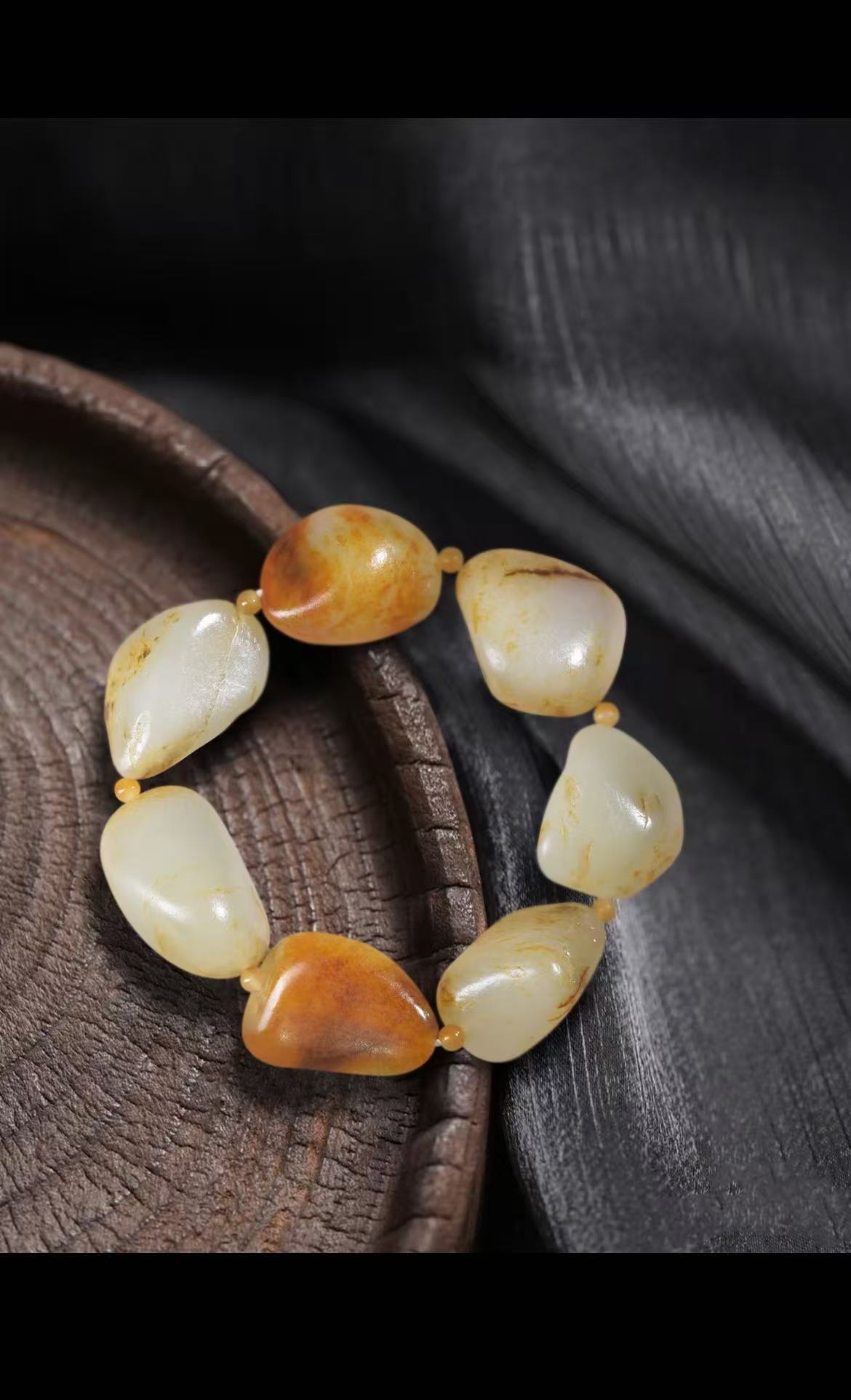 精品红皮和田玉手串