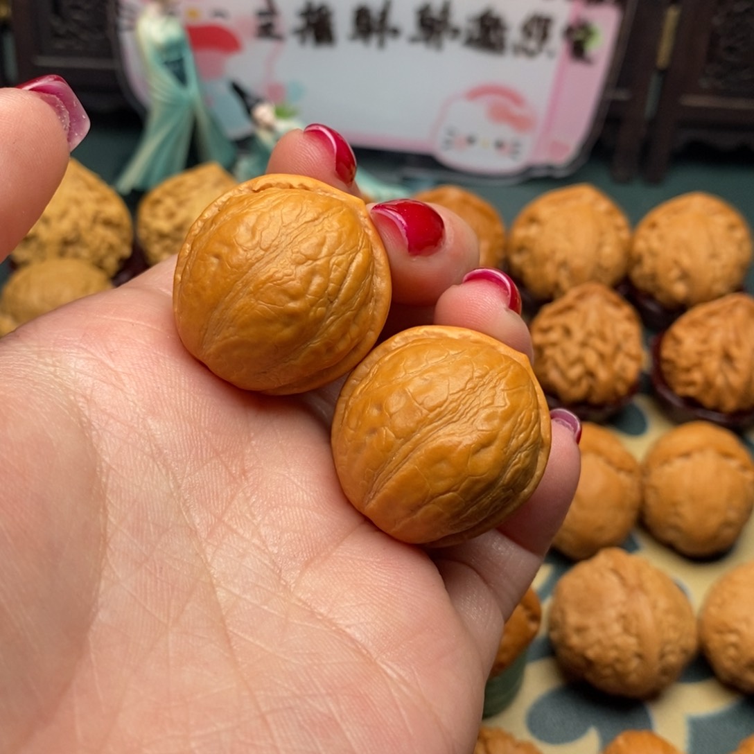 文玩核桃把件金佛