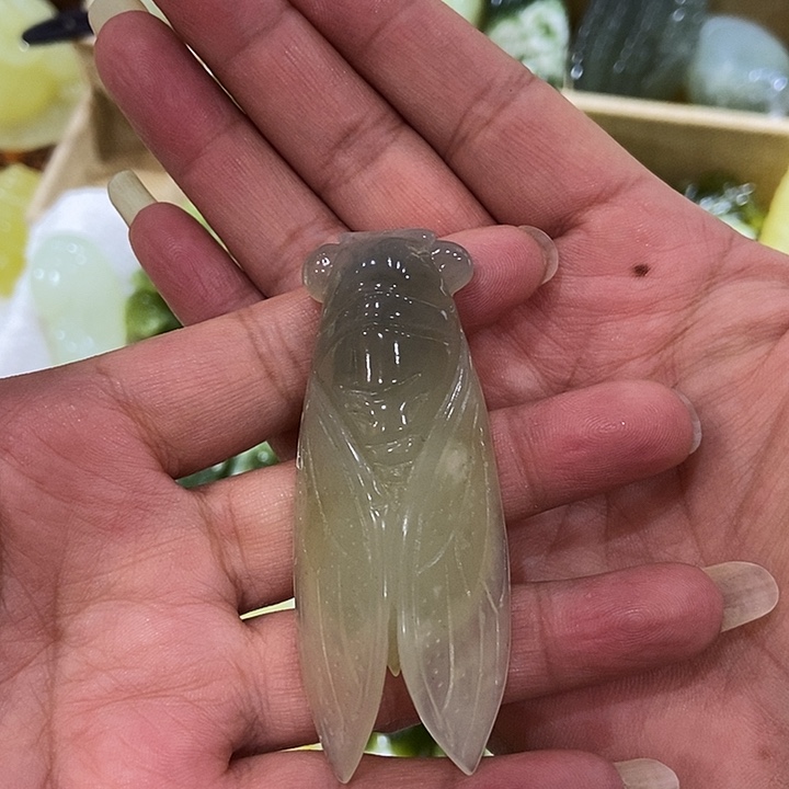蛇纹石玉手把件合金