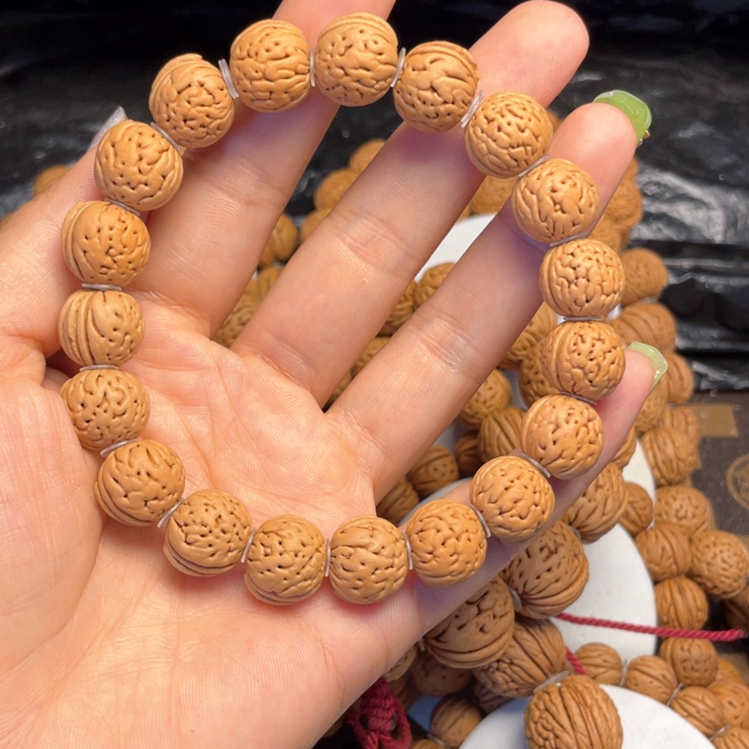 魏***人桃核手串桃核手串13+野生