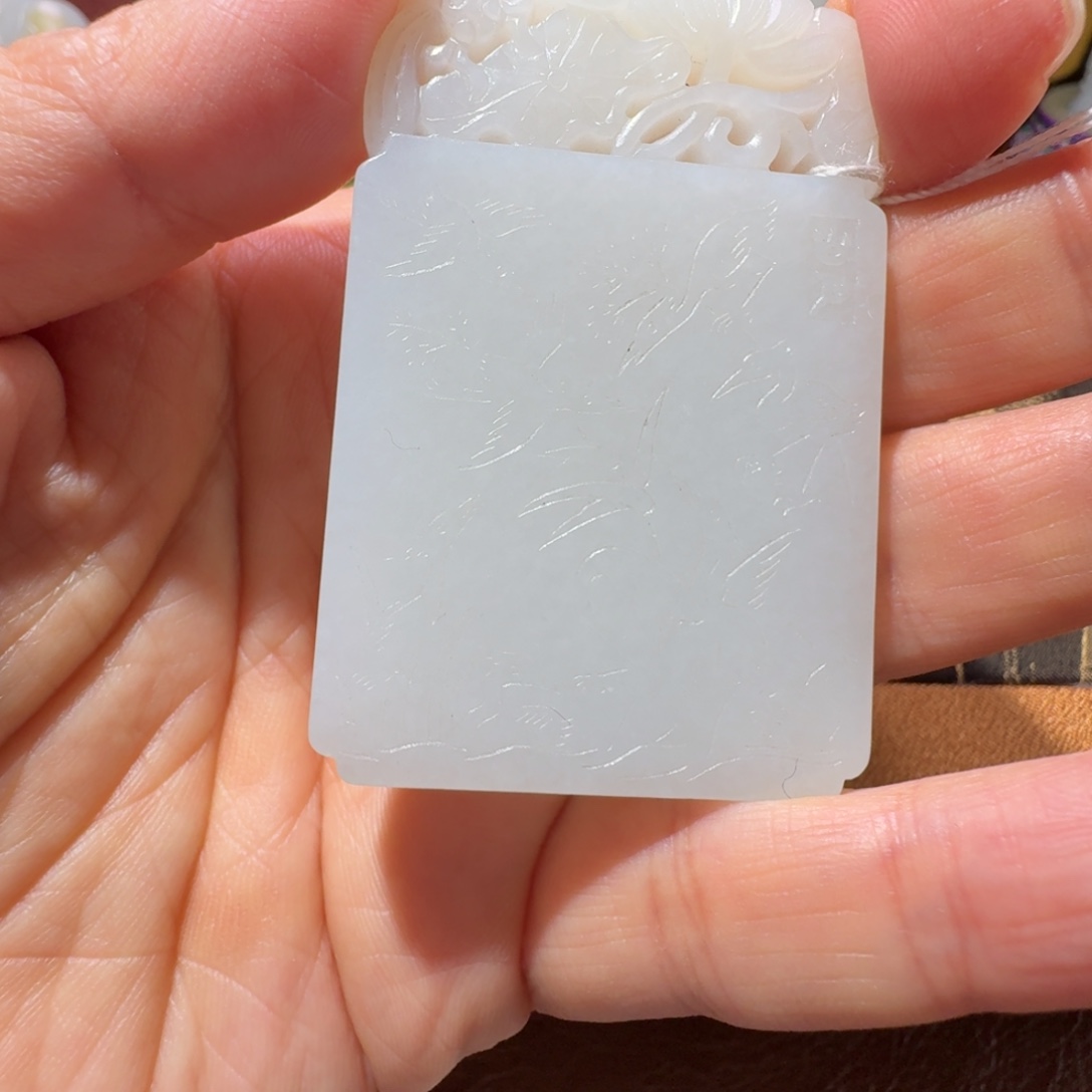 光***事和田玉未镶嵌把件