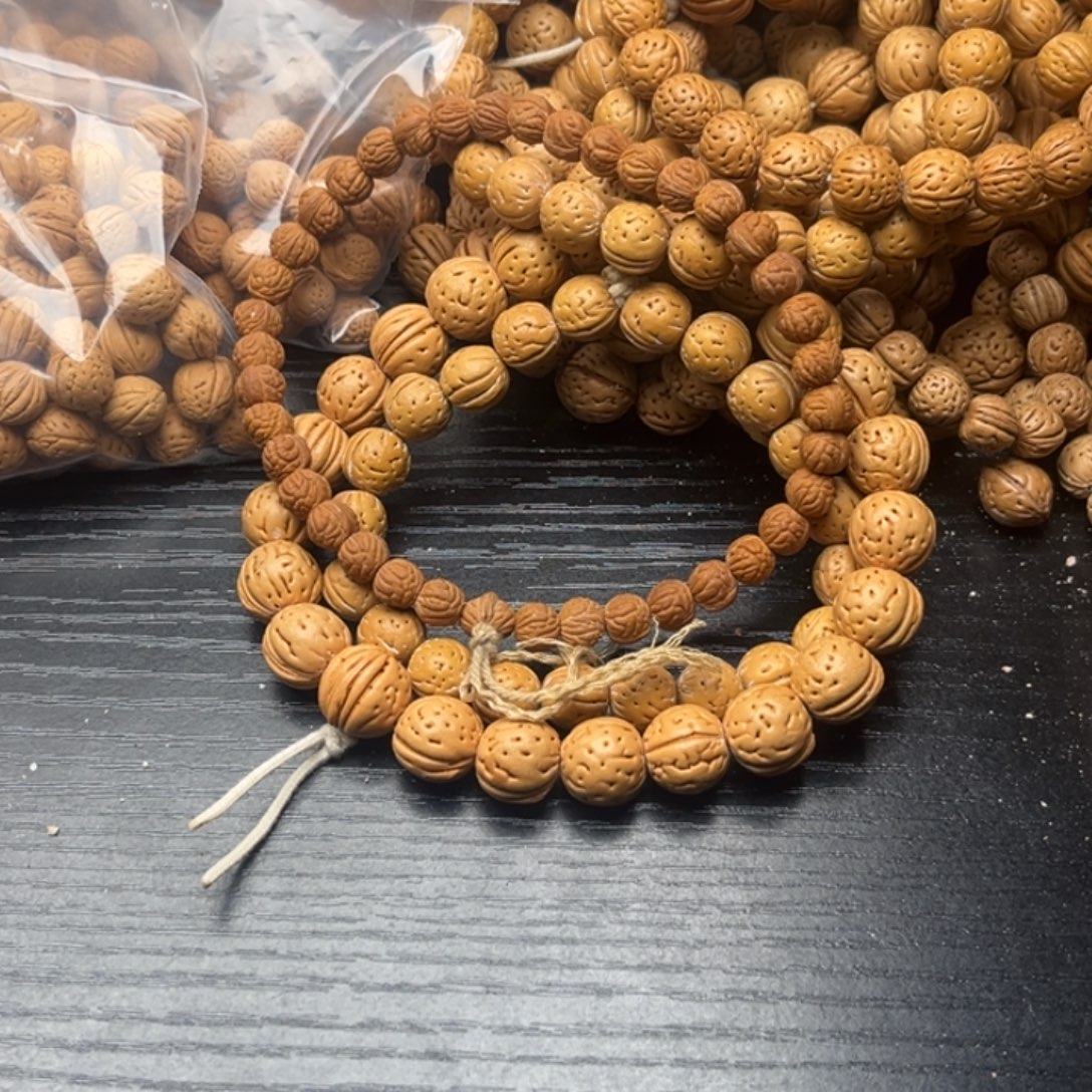 衣***昂文玩核桃手串小桃核散籽批发