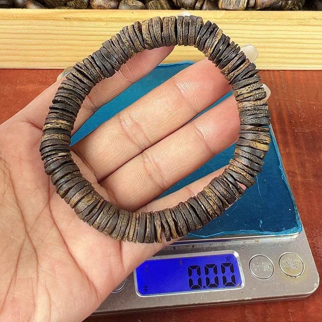 沉香碎屑沉香卡10金钱片单圈沉水13g