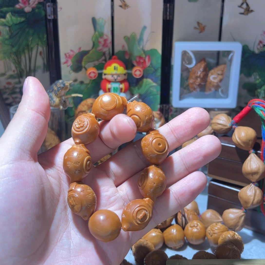 爱****息橄榄核雕手工把把壶