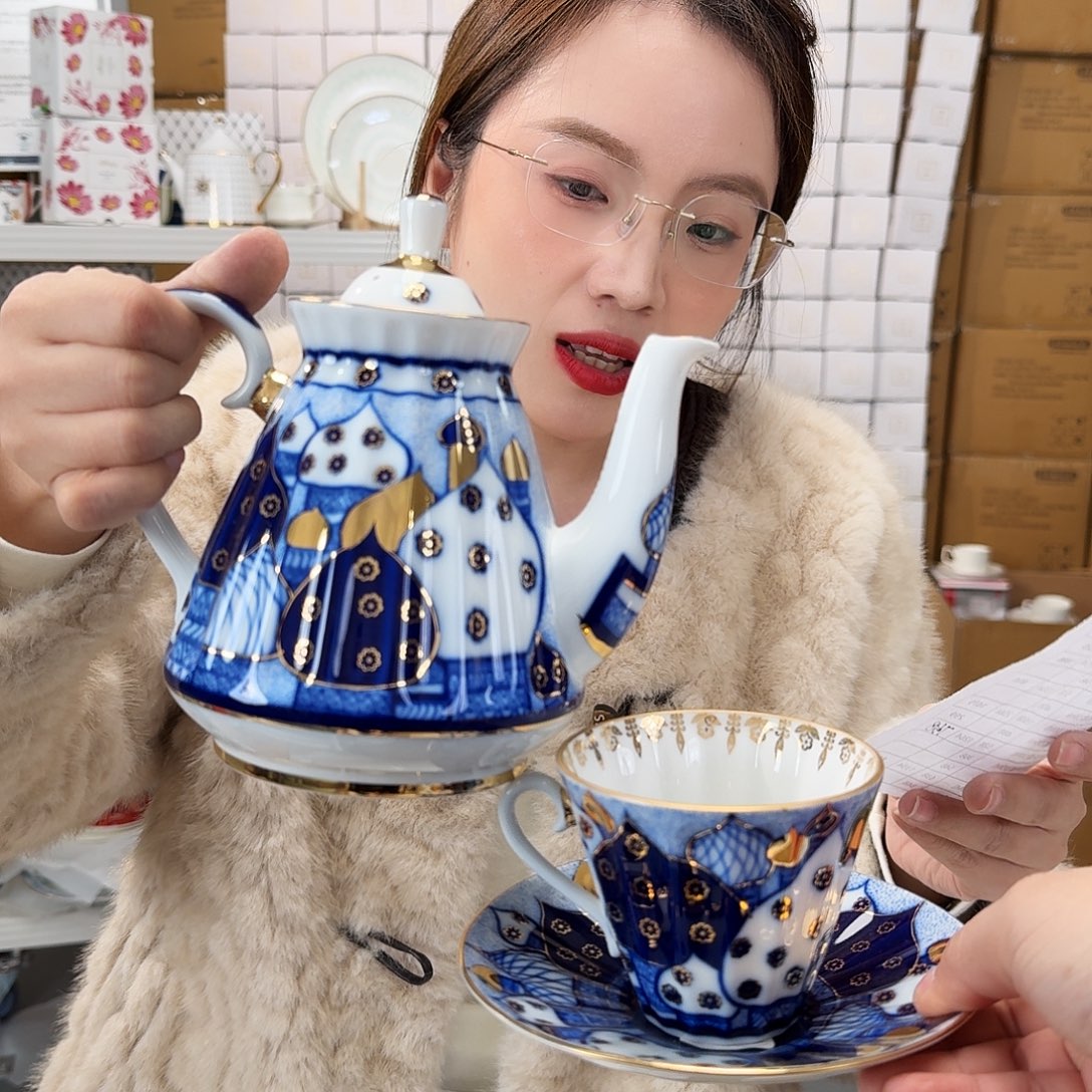 念***子骨瓷一壶2杯碟1334元顺丰