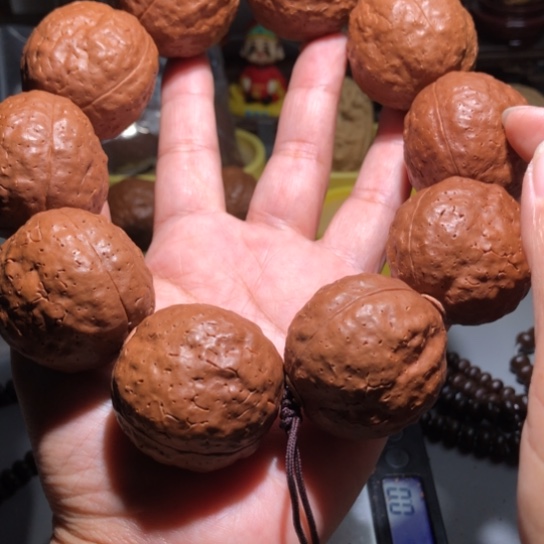 用***8橄榄核吊坠三瓣金刚手持