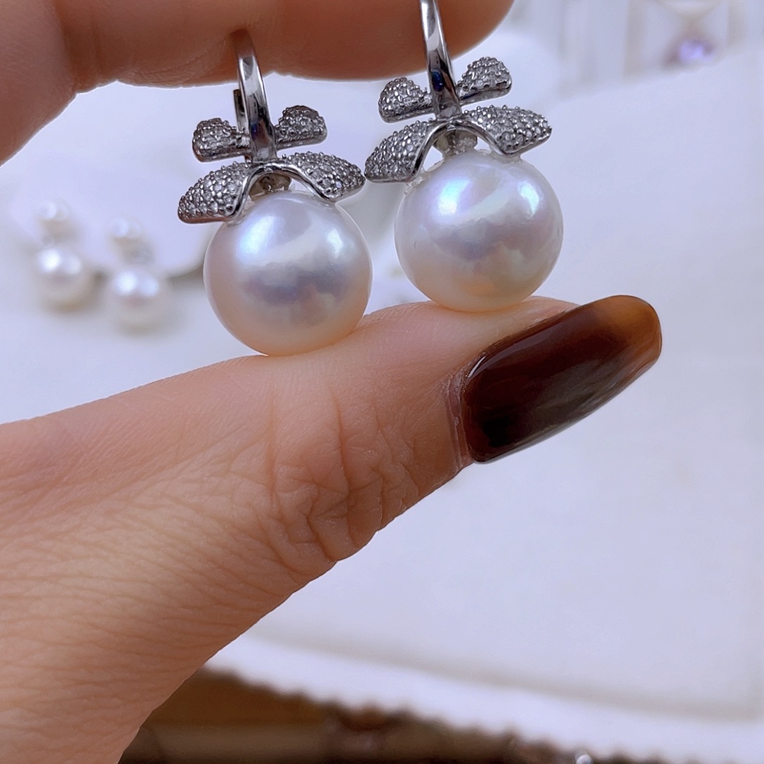 丽***生银S925镶嵌淡水珍珠耳饰