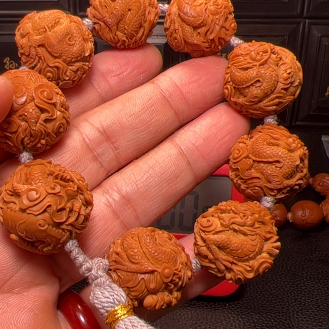 君***尽手串橄榄核龙生九子