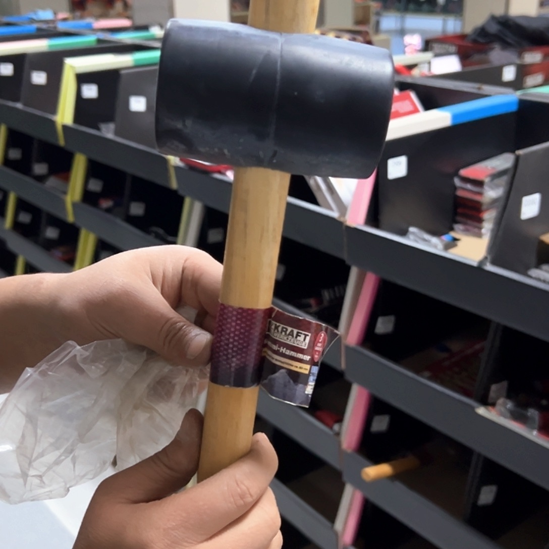 D127 黑色橡胶皮锤一把