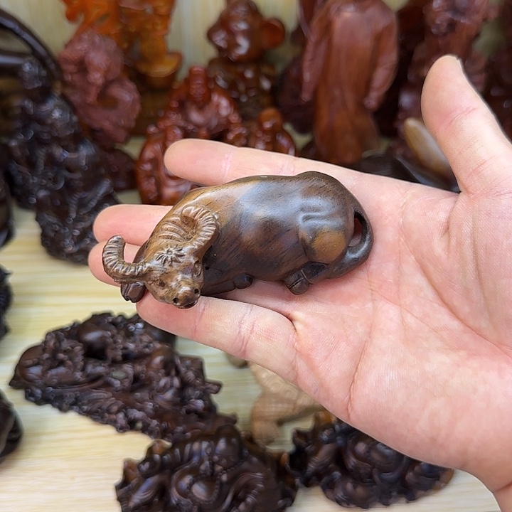 木黑檀木10双色卧牛一只