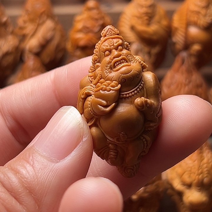 把***生橄榄核吊坠橄榄核