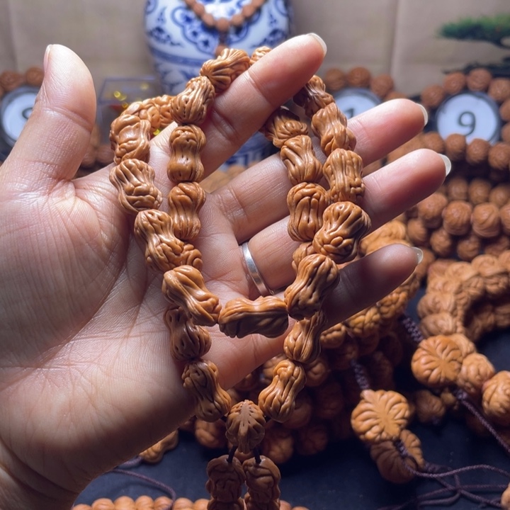 h***、桃核吊坠花生手持