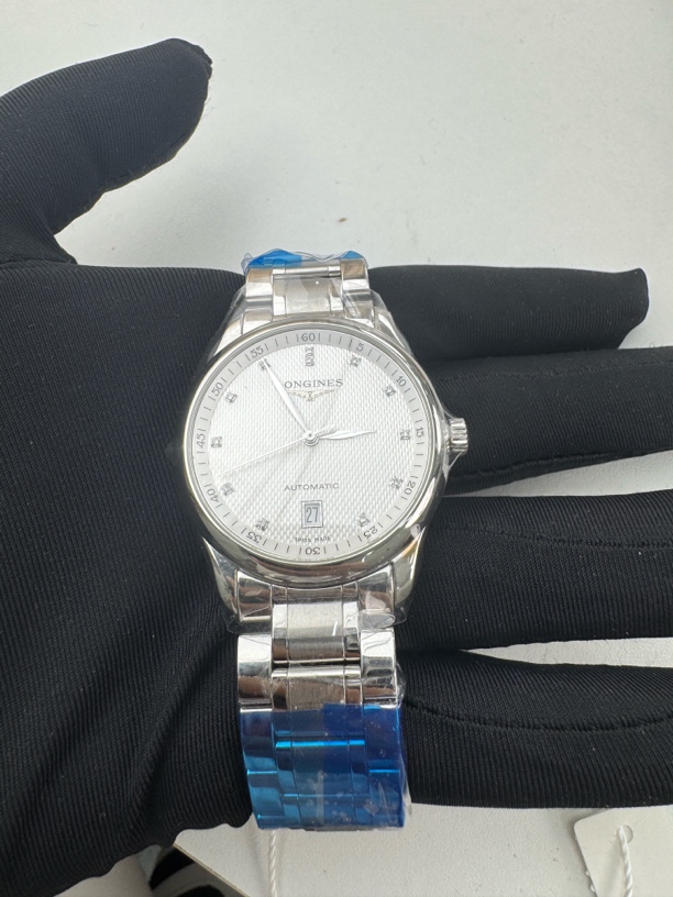 99新 Longines/浪琴 99新男士制表传统机械表表径36mm公价18400