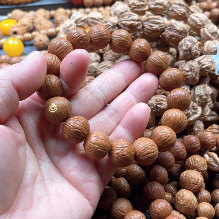 猴头核桃手串1.5同尺聚宝盆带金标