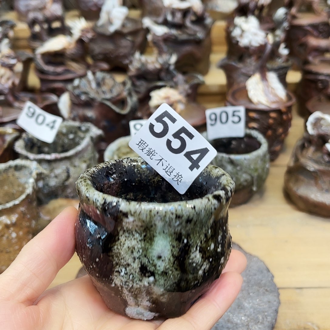 李***风瓶柴烧粗陶手捏杯摆件漏水