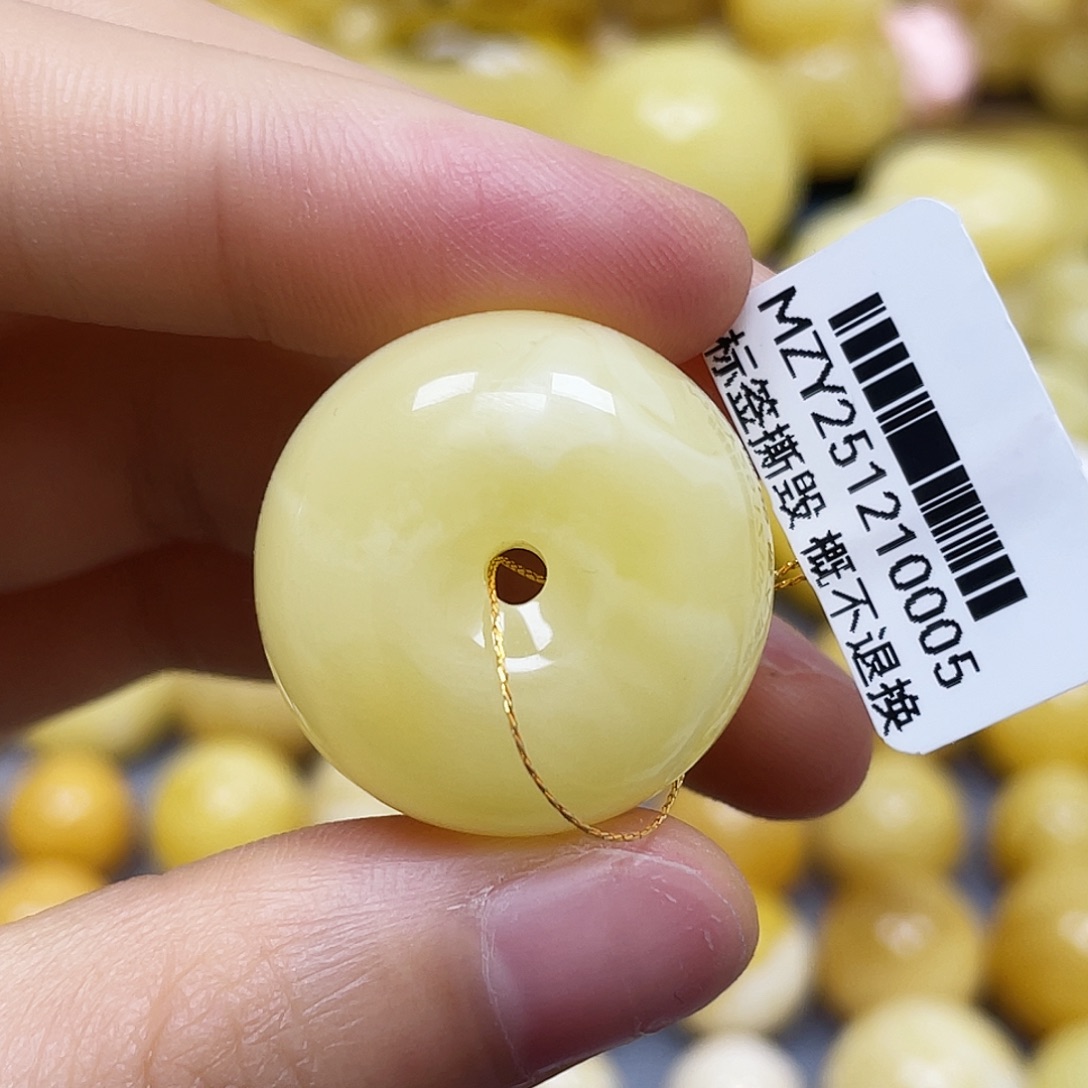 蜜蜡未镶嵌裸石25.6*13.9mm.瑕