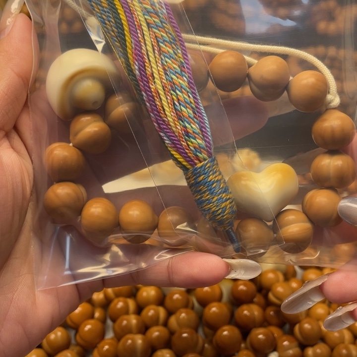 影***子吊坠猴头核桃微瑕屁桃加爱心元宝流苏