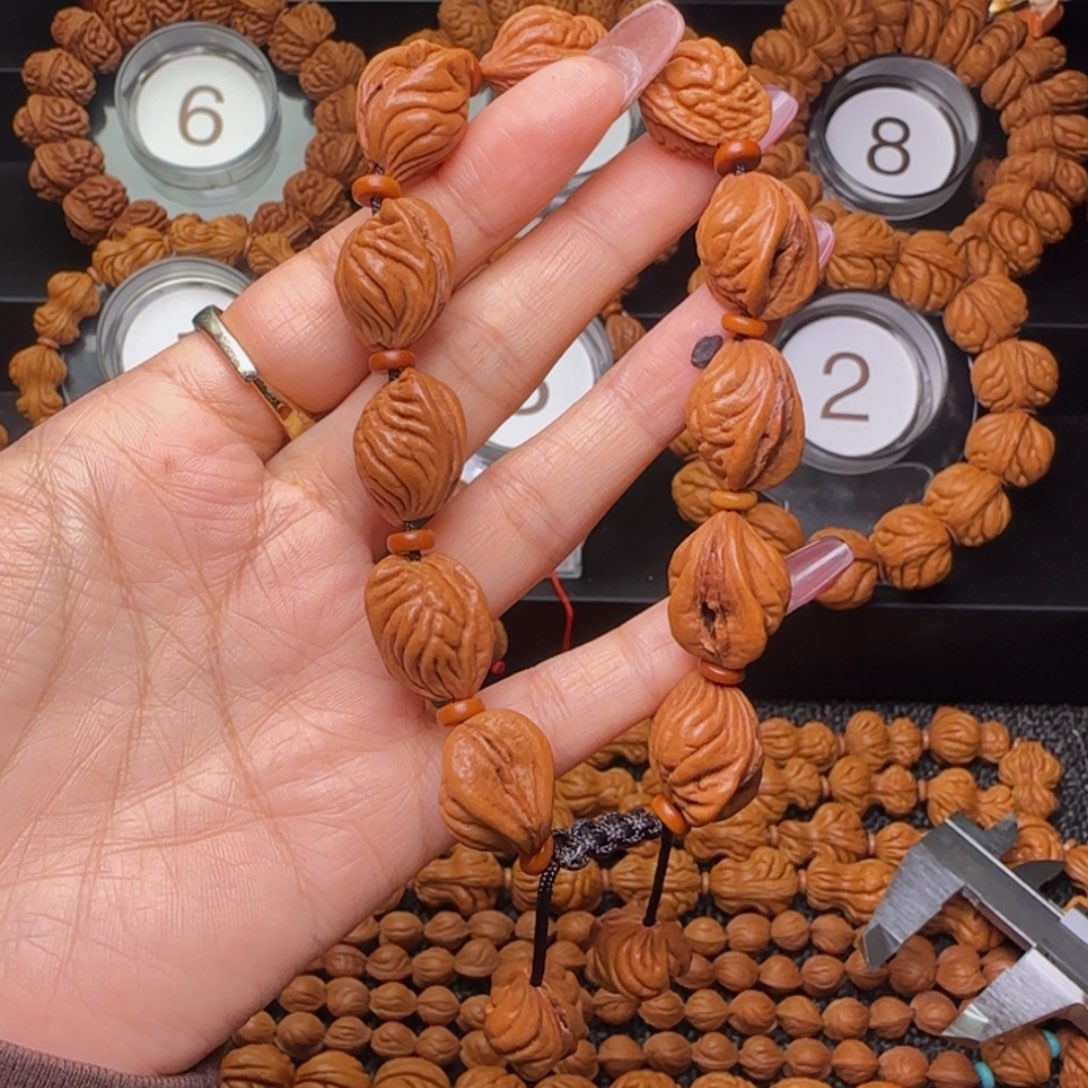 宋***杰吊坠桃核生命之源手串