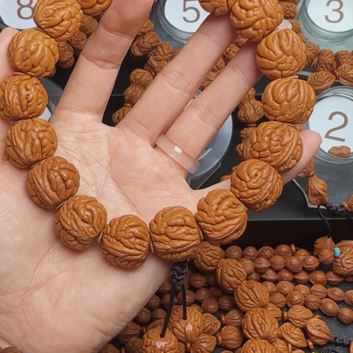 友***桃核手串龙纹桃核