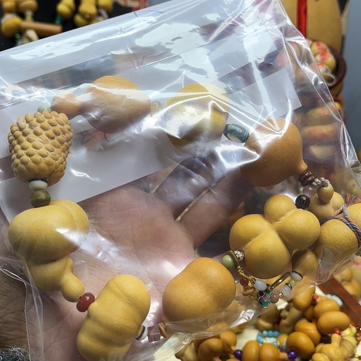 悠***然木质类纯手工编织小葫芦手持