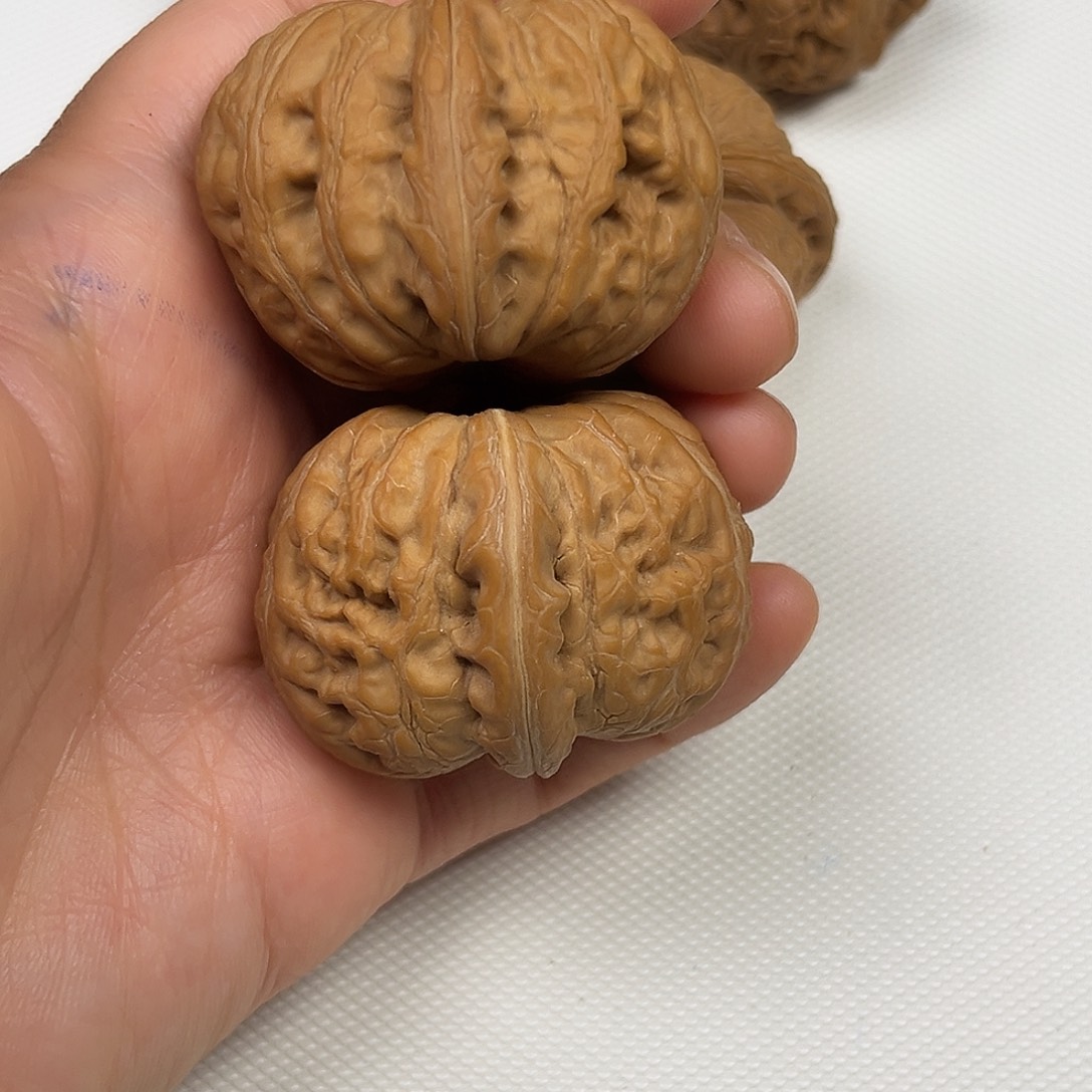 小***丁文玩核桃吊坠元宝