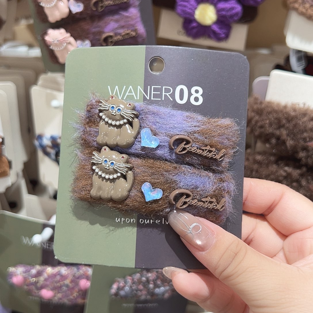 非金属咖色小猫紫色掰掰