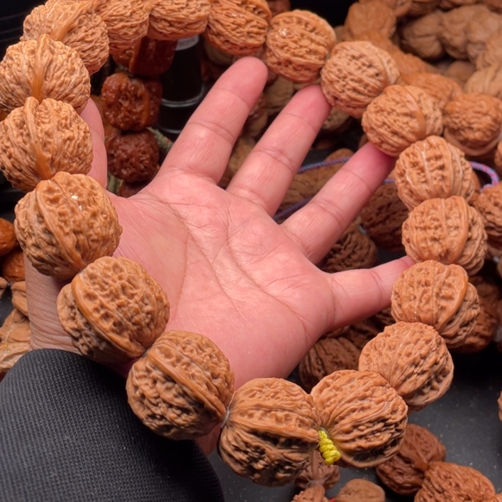 文玩核桃吊坠释*?4野生磨盘