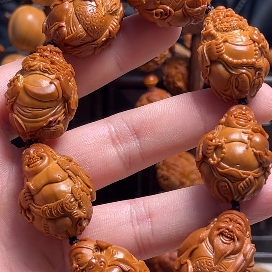 橄榄核吊坠开**好整身财神