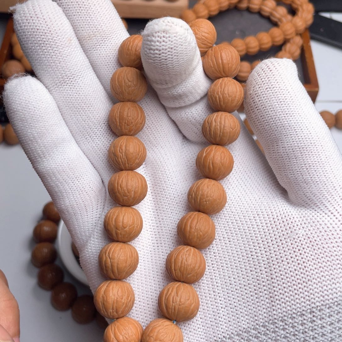 猴头核桃手串清*…纯天然无修凤羽