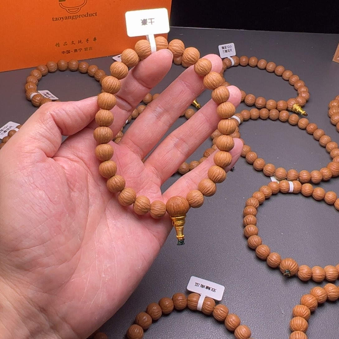 程***、猴头核桃吊坠土豪