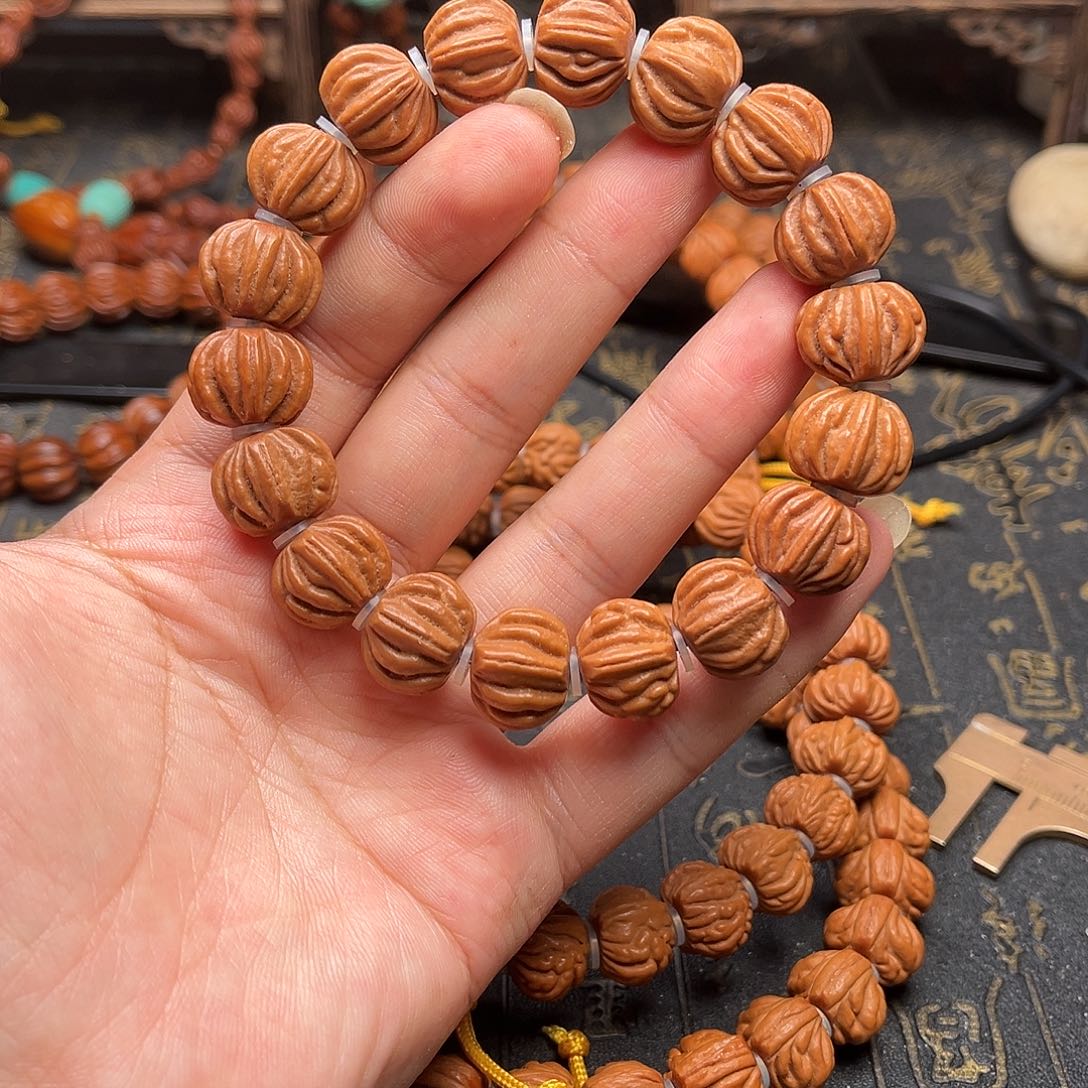 吊坠桃核佛手手串