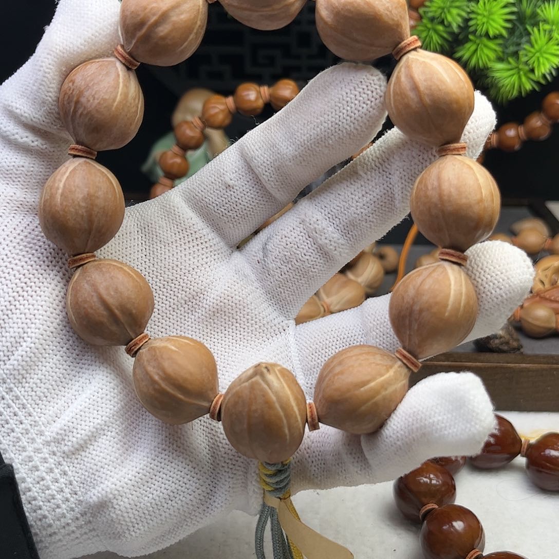 手串/手链橄榄核梅***。1.9三花铁核