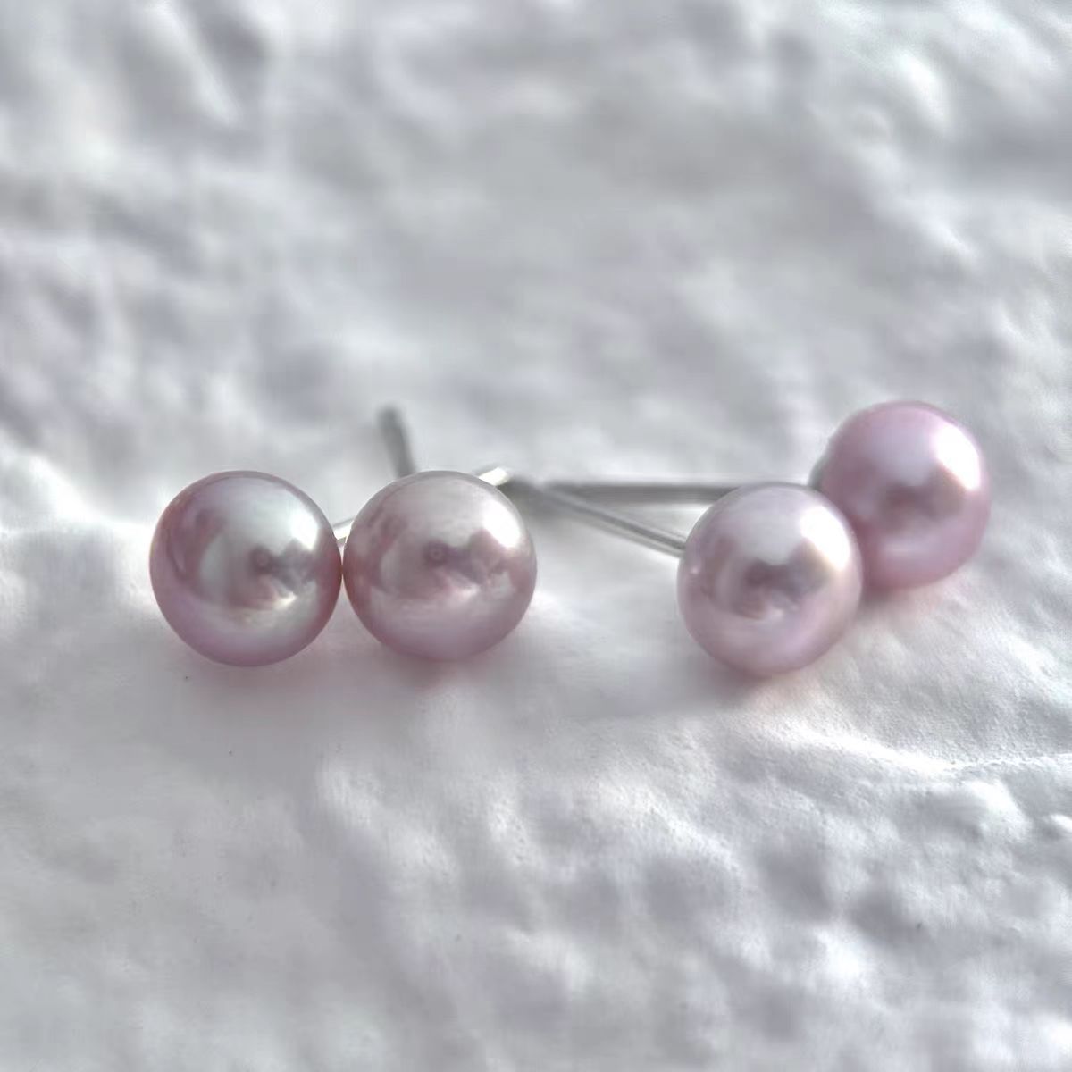 6-7mm曼塔玫瑰紫粉色珍珠耳钉
