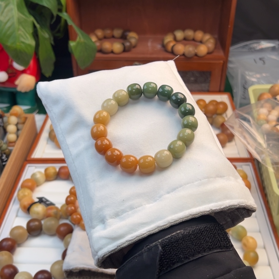 菩提根/象牙果手串小**心默认微微瑕彩虹渐变玉化料