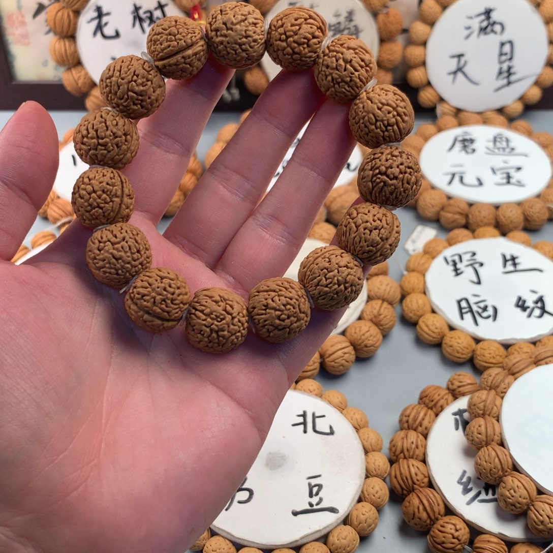 桃核手串龙鳞凤尾