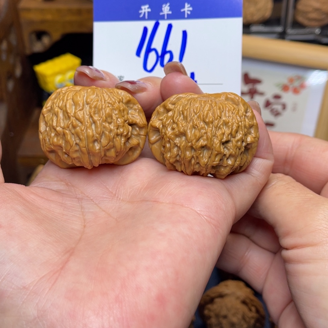 桃核把件我**武磨盘40李。    