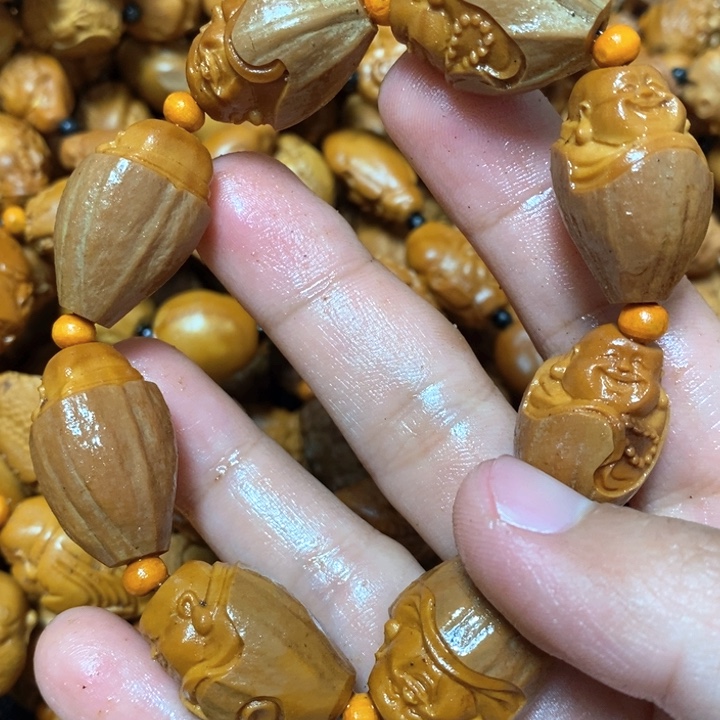 手串/手链橄榄核橄榄微瑕包衣米勒