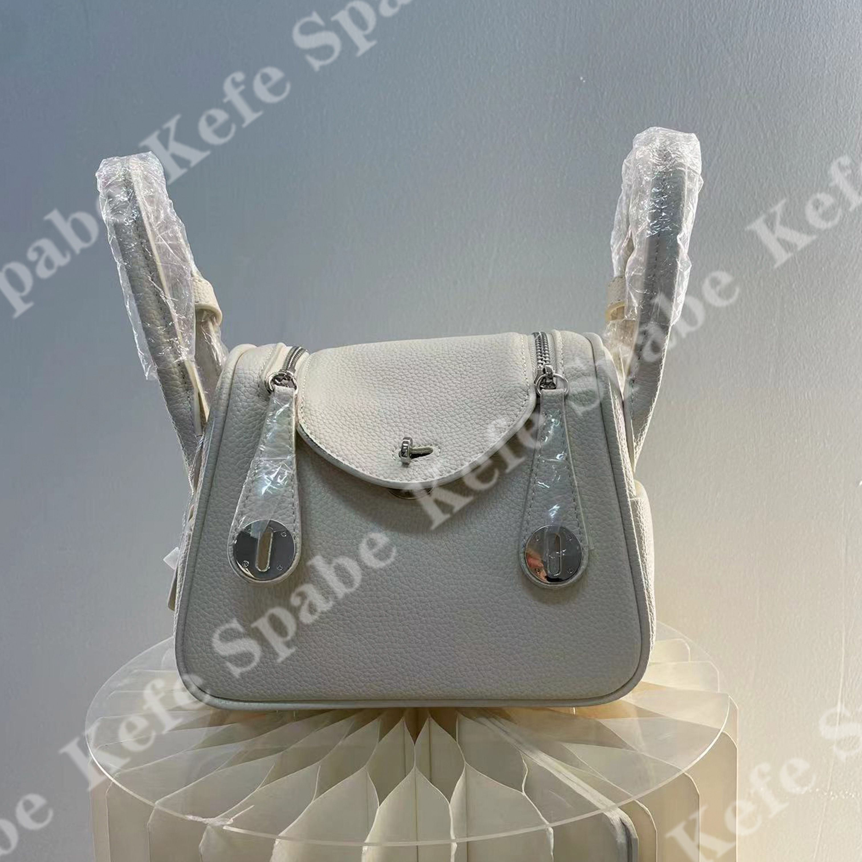 HM203   25新款白色MINI-LD手提单肩斜挎包