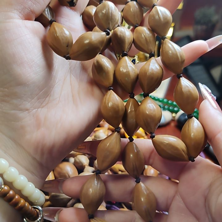 护***)橄榄核吊坠脖挂去霜