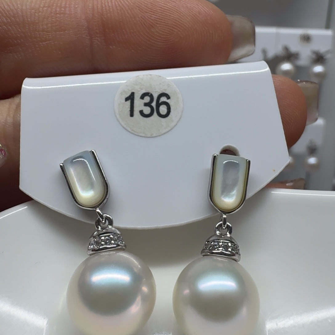 柠****淡水珍珠银S925镶嵌耳饰珍珠10.5